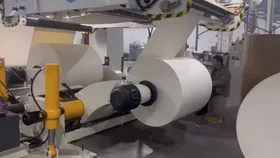 Ligne d’enduction par extrusion sur mesure pour un client américain